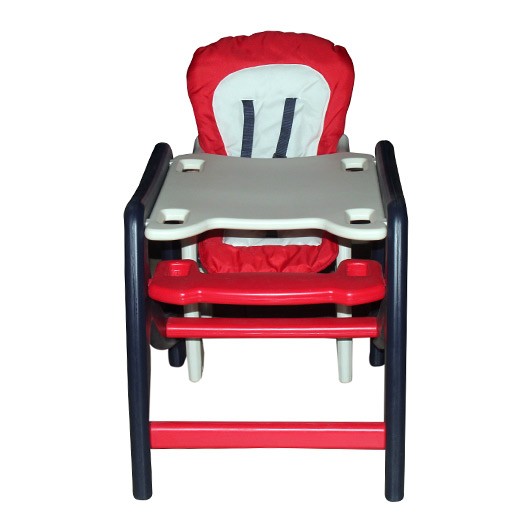 baby rocking in high chair